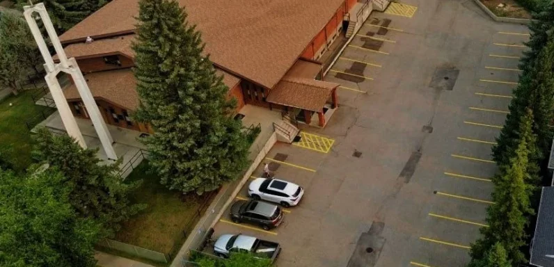 Parking lot line striping at Croatian Catholic Parish in Calgary