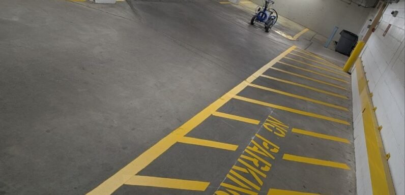 Freshly painted parking lines in a Salvation Army underground parking lot in Calgary