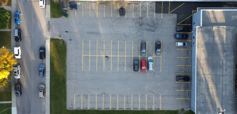 Freshly line-striped parking lot at First Evangelical Free Church with crisp white parking stall lines